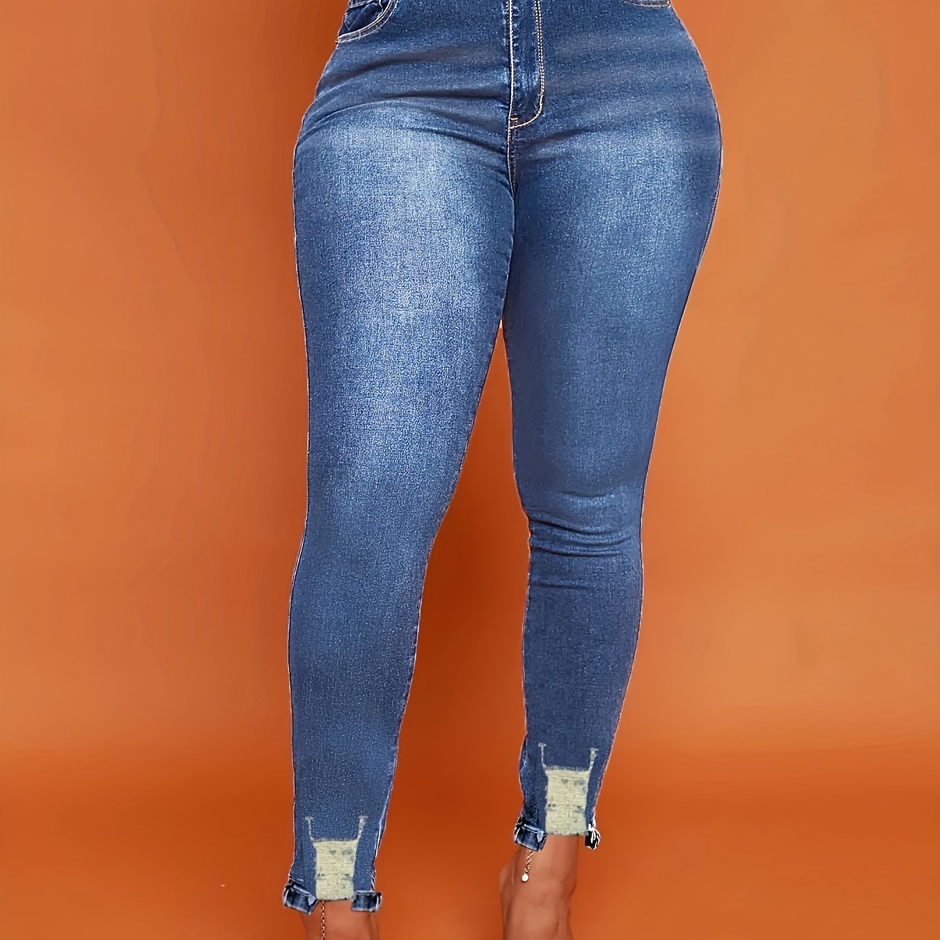Chic & Stylish Blue Ripped Skinny Jeans for Women - Versatile, High-Stretch, Easy-Care Denim with Raw Hem