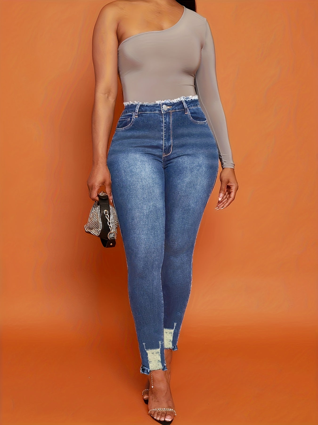 Chic & Stylish Blue Ripped Skinny Jeans for Women - Versatile, High-Stretch, Easy-Care Denim with Raw Hem